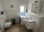 Lukratives Wohn- und Geschäftshaus mit Ferienwohnungen - Badezimmer