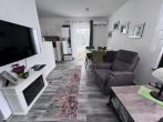 Whnzimmer mit elek. Kamin