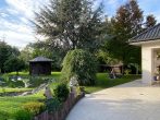 Sehr gepflegtes Einfamilienhaus mit großzügigem West-Grundstück - Blick in den Garten
