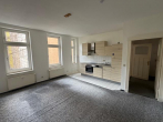 Wohnzimmer (2) - Freie 3-Zimmer-Eigentumswohnung mit großem Tageslichtbad