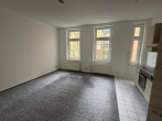 Wohnzimmer - Freie 3-Zimmer-Eigentumswohnung mit großem Tageslichtbad