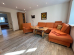 Wohnzimmer (2) - Stilvolle Auszeit in Graal-Müritz – hochwertige Ferienwohnung